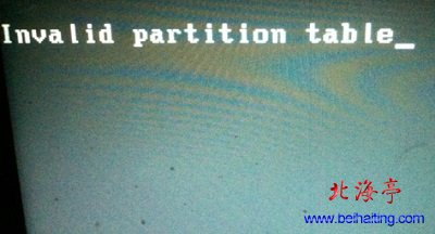 电脑进不去系统开机黑屏提示:Invalid partition Table---问题截图